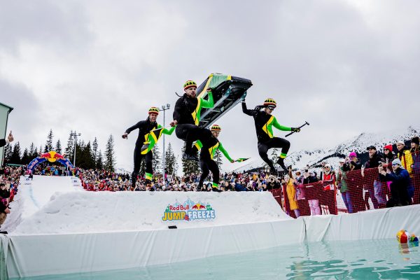 Red Bull Jump and Freeze_Jasna_2023_02. - Participants jumping into the water at Red Bull Jump & Freeze in Jasna, Slovakia on April 1, 2023. // Sona Maleterova / Red Bull Content Pool // SI202304030990 // Usage for editorial use only //